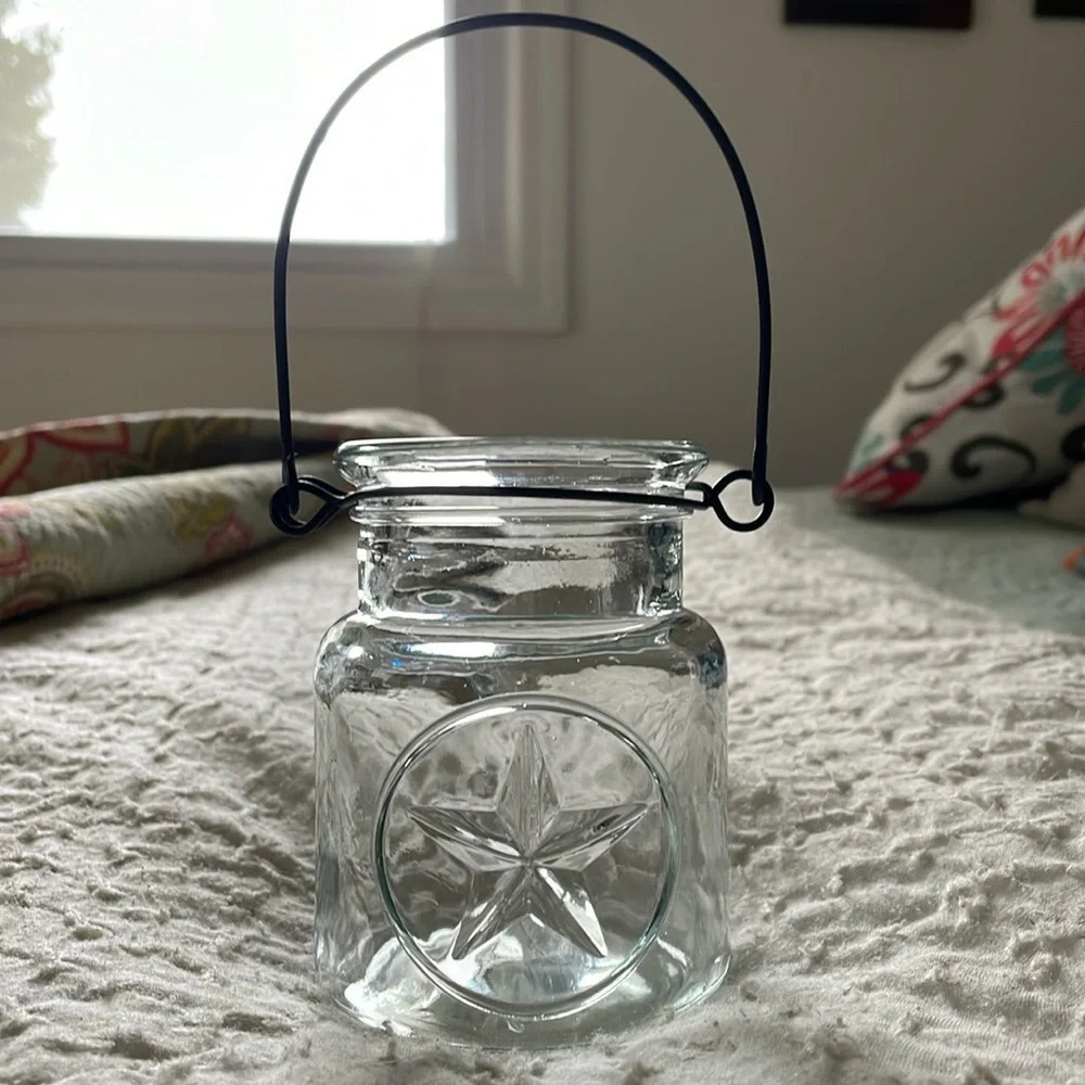 Clear Glass Jar 3D Star on Front. Black Metal Handle. Patio decor. Candle holder